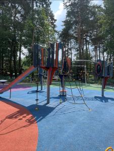 a playground with a slide in a park at Castlewood Holiday Park in Antrim +26 photos