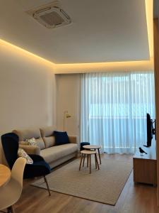O zonă de relaxare la Apartamento Hortensia Diseño Exclusivo +10 fotografii
