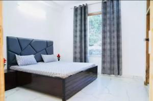 Postel nebo postele na pokoji v ubytování Heers Villa + 14 fotografií