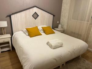 Posteľ alebo postele v izbe v ubytovaní Agréable appartement et terrasse à 2 pas de la mer