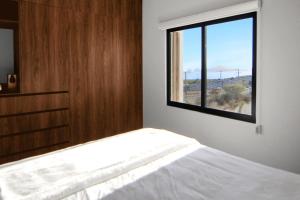 Postel nebo postele na pokoji v ubytování 1st Floor with Rooftop Access to the Best Views in Cabo