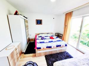 Postel nebo postele na pokoji v ubytování Bus Station Hostel