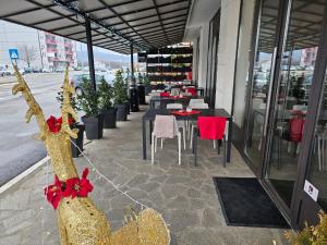 مطعم أو مكان آخر لتناول الطعام في Hotel Aloha