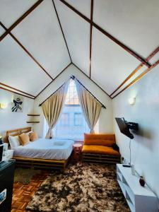 Ένα ή περισσότερα κρεβάτια σε δωμάτιο στο Rorot penthouse studio Kilimani home away +9 φωτογραφίες
