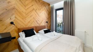 Postel nebo postele na pokoji v ubytování Apartamenty Good Time - Belle View - Centrum + 274 fotografií