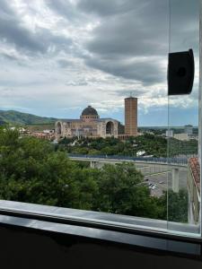 a view of a city from a window at Imperial Hotel in Aparecida