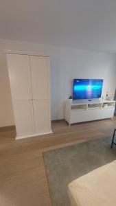 Televisyen dan/atau pusat hiburan di Maison de la mer
