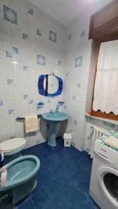 Koupelna v ubytování Casa Vacanze Nonna Tetta + 9 fotografií