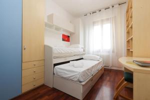 Ένα ή περισσότερα κρεβάτια σε δωμάτιο στο Modena Visit Apartment