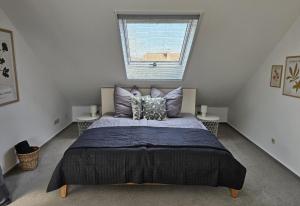 Ein Bett oder Betten in einem Zimmer der Unterkunft Landhaus SoonZauber