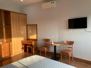 TV a/nebo společenská místnost v ubytování Nguyên Thái