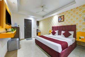 Postel nebo postele na pokoji v ubytování Hotel Happy Stay Delhi Airport
