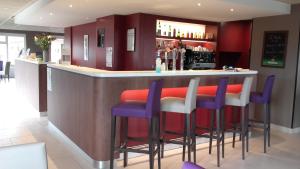 The lounge or bar area at Campanile Sablé-Sur-Sarthe Vion