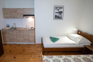 Postel nebo postele na pokoji v ubytování Penzion Plesnivec + 27 fotografií