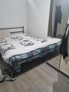 Ένα ή περισσότερα κρεβάτια σε δωμάτιο στο Nice stay close to paris