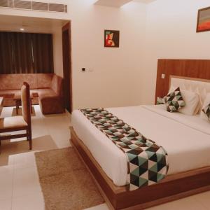 Postel nebo postele na pokoji v ubytování Hotel Beatific Epsilon