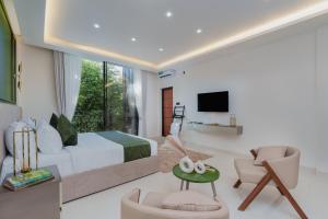 TV a/nebo společenská místnost v ubytování Orbit88 Hotel by AMR + 21 fotografií