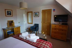 TV a/nebo společenská místnost v ubytování Trotternish B&B