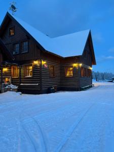 Hotel Vydrovy boudy Pec pod Sněžkou v zimě