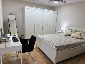Ένα ή περισσότερα κρεβάτια σε δωμάτιο στο Casa Arucas Sansofi