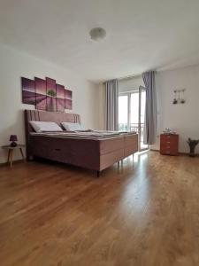 Postel nebo postele na pokoji v ubytování Apartman Franc