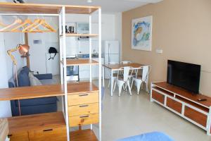 TV a/nebo společenská místnost v ubytování Inmejorable! Piso alto en Centro BsAs, Moderno con parrilla y pileta 3 pax