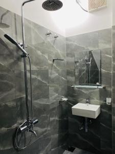 Koupelna v ubytování Mihitha Resort + 4 fotografie
