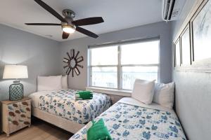 Postel nebo postele na pokoji v ubytování The Inn on Siesta Key + 67 fotografií