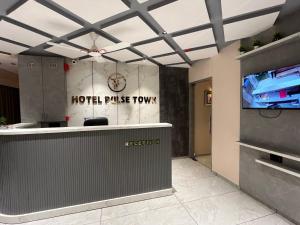 TV a/nebo společenská místnost v ubytování Hotel Pulse Town