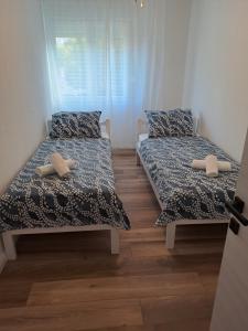 Postel nebo postele na pokoji v ubytování Sunny Moon