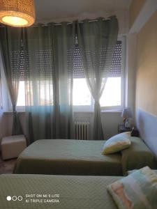 Postel nebo postele na pokoji v ubytování Casa di Ana