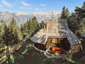 an overhead view of a cabin in the mountains at Velika planina - Chalet Stane - Alps in Stahovica +36 photos