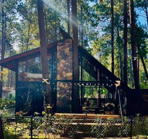 Κήπος έξω από το Cabaña en el bosque