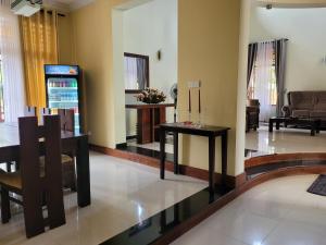 a living room with two tables and a couch at Bigcity Villa in Katunayaka