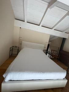Postel nebo postele na pokoji v ubytování Cascina Calupo