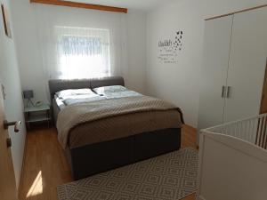 Ella Ferienwohnung客房内的一张或多张床位