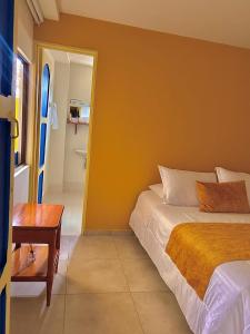 Postel nebo postele na pokoji v ubytování Hotel Dorado Jardín