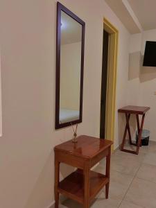 TV a/nebo společenská místnost v ubytování Hotel Dorado Jardín
