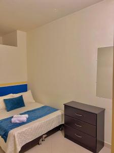 Postel nebo postele na pokoji v ubytování Hotel Dorado Jardín