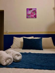 Postel nebo postele na pokoji v ubytování Hotel Dorado Jardín