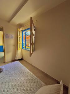 Postel nebo postele na pokoji v ubytování Hotel Dorado Jardín