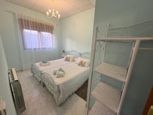 Postel nebo postele na pokoji v ubytování Viviendas Turisticas El Carrascal