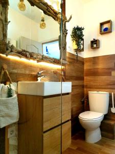 a bathroom with a sink and a toilet at Ajuy Fuerteventura House in Ajuy