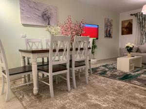 TV a/nebo společenská místnost v ubytování Casa De Madinaty -مدينتي