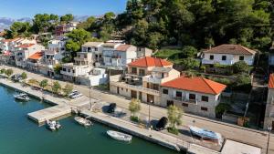 an aerial view of a town with boats in the water at Apartment Bazdaric in Novigrad Dalmatia +33 photos
