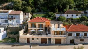 an aerial view of a house in a city at Apartment Bazdaric in Novigrad Dalmatia