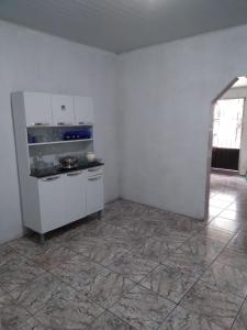 Kuchyň nebo kuchyňský kout v ubytování Casa Grande e Aconchegante para a COP 30