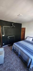 Cama ou camas em um quarto em Jeremias Hostel Bar