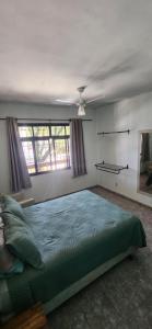 Cama ou camas em um quarto em Jeremias Hostel Bar