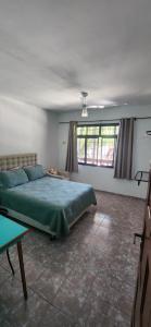 Cama ou camas em um quarto em Jeremias Hostel Bar